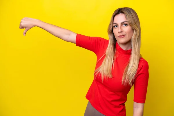 Young Uruguayan Woman Isolated Yellow Background Showing Thumb Negative Expression — Stock Photo, Image