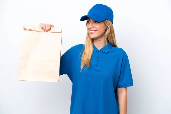 Young Uruguayan Woman Taking Bag Takeaway Food Isolated White Background — 스톡 사진