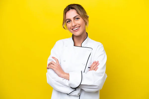 Uruguayan Chef Woman Isolated Yellow Background Keeping Arms Crossed Frontal —  Fotos de Stock