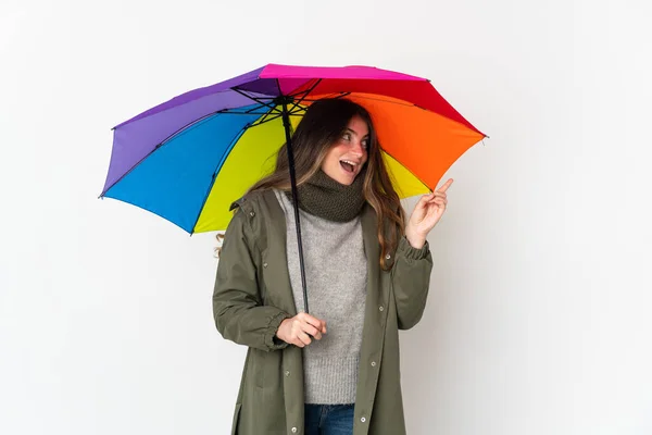 Young Caucasian Woman Holding Umbrella Isolated White Background Intending Realizes — стоковое фото