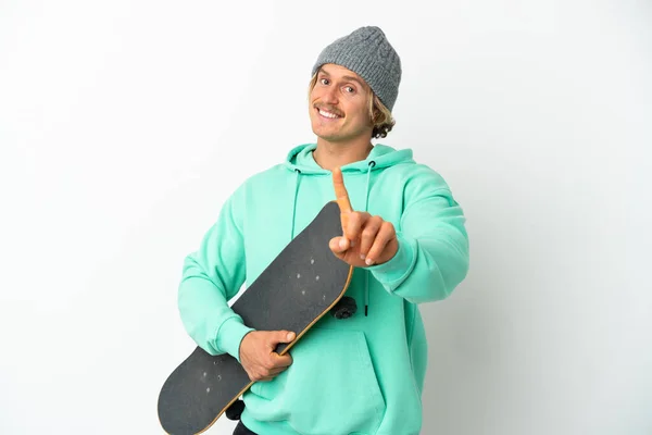 Young Skater Blonde Man Isolated White Background Showing Lifting Finger — Stock Photo, Image