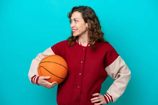 Young Caucasian Basketball Player Woman Isolated Blue Background Posing Arms — Fotografia de Stock