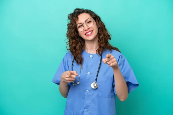 Young Nurse Caucasian Woman Isolated Blue Background Points Finger You — Stok fotoğraf