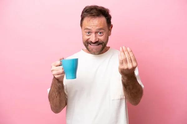 Middle Age Caucasian Man Holding Cup Coffee Isolated Pink Background — стоковое фото