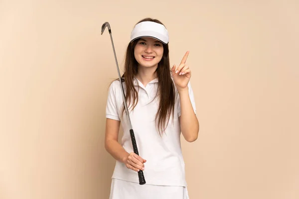 Jovem Ucraniana Golfista Menina Isolado Fundo Bege Mostrando Levantando Dedo — Fotografia de Stock