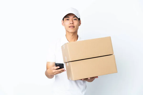 Delivery Chinese Man Isolated White Background Sending Message Mobile — Stock Photo, Image