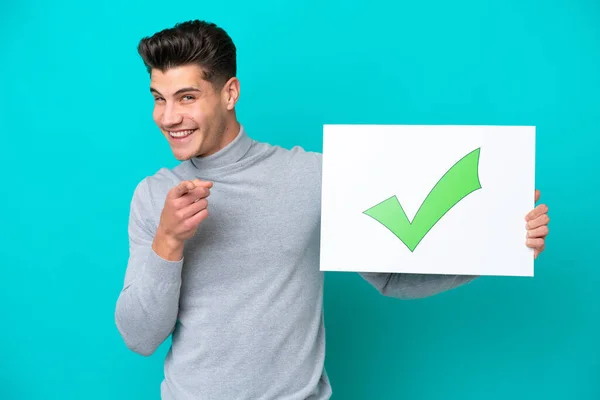 Young Handsome Caucasian Man Isolated Blue Bakcground Holding Placard Text — Stock Fotó