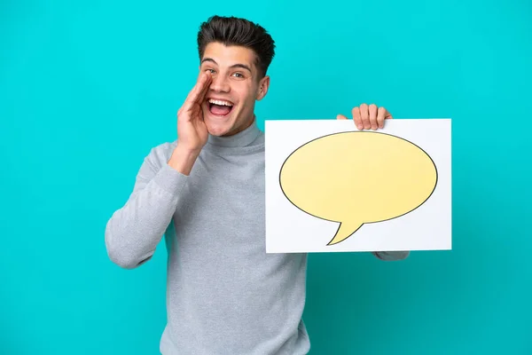 Young Handsome Caucasian Man Isolated Blue Bakcground Holding Placard Speech — ストック写真