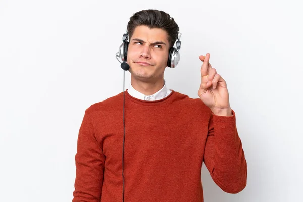 Telemarketer Caucasian Man Working Headset Isolated White Background Fingers Crossing — Stock Photo, Image