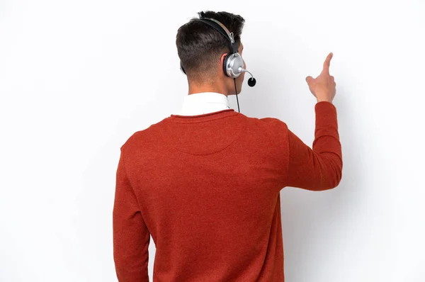 Telemarketer Caucasian Man Working Headset Isolated White Background Pointing Back — стоковое фото