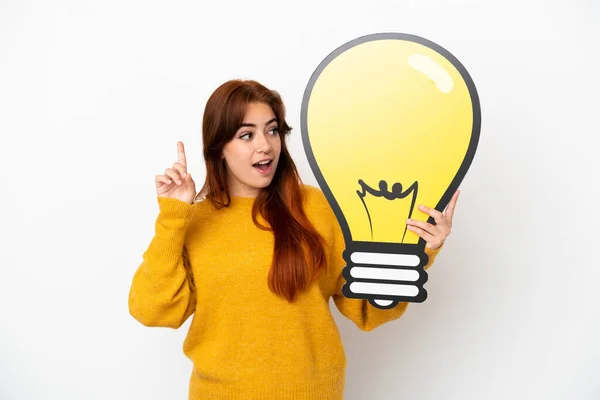 Young Redhead Woman Isolated White Background Holding Bulb Icon Thinking — Stock Photo, Image