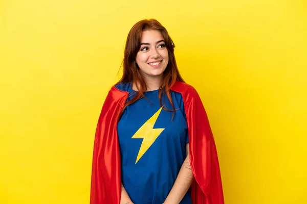Super Hero Redhead Woman Isolated Yellow Background Looking While Smiling — Photo