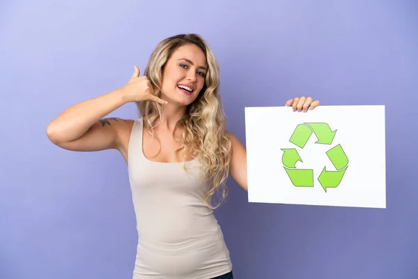 Young Brazilian Woman Isolated Purple Background Holding Placard Recycle Icon —  Fotos de Stock
