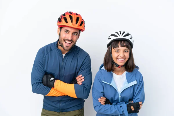 Young Cyclist Couple Isolated White Background Keeping Arms Crossed While — Stock Fotó