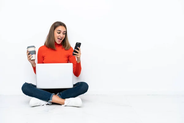 Young Caucasian Woman Sitting Floor Laptop Holding Coffee Take Away — Stockfoto