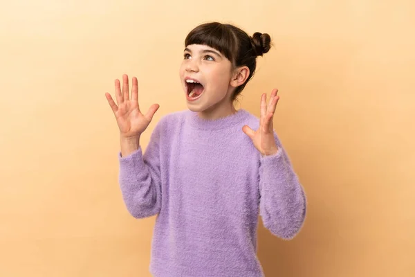 Little Caucasian Girl Isolated Beige Background Surprise Facial Expression — Stock Photo, Image