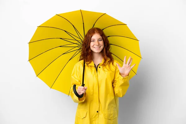 Teenager Redhead Girl Rainproof Coat Umbrella Isolated White Background Counting — Stock Photo, Image