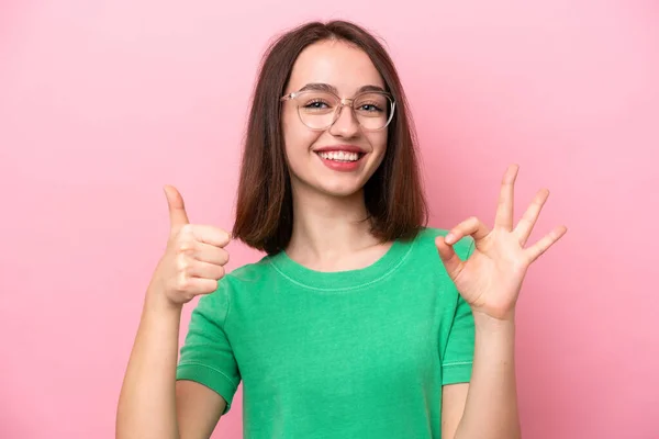 Young Ukrainian Woman Isolated Pink Background Glasses Doing Sign — Foto Stock