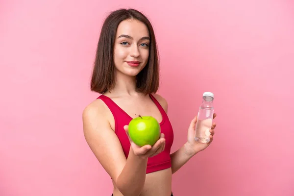 Young Ukrainian Woman Isolated Pink Background Apple Bottle Water — Fotografia de Stock