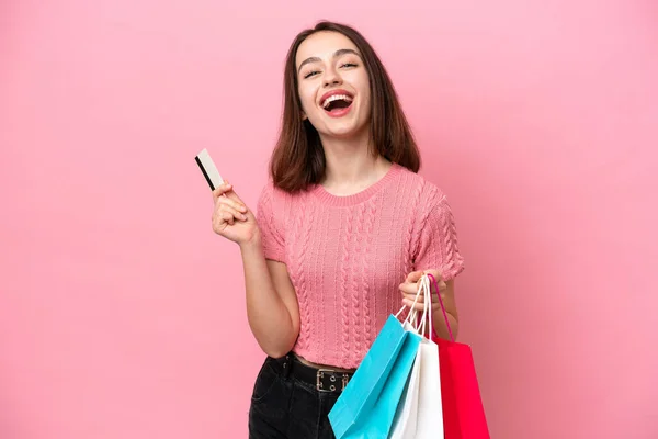 Young Ukrainian Woman Isolated Pink Background Holding Shopping Bags Credit — Zdjęcie stockowe