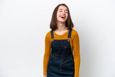 Genç Ukraynalı kadın beyaz arka planda izole edilmiş gülüyor.