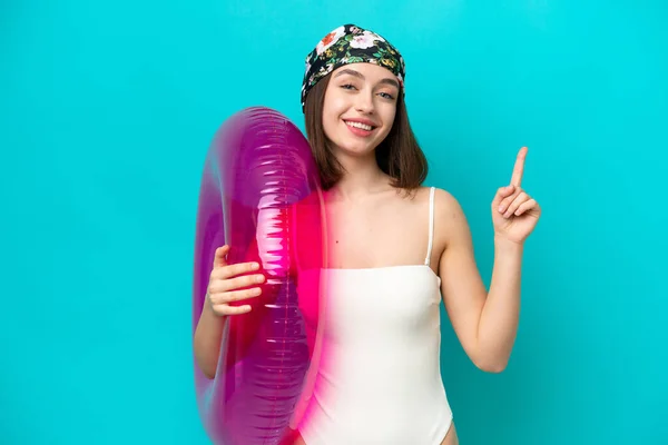 Young Ukrainian Woman Holding Air Mattress Isolated Blue Background Showing — ストック写真