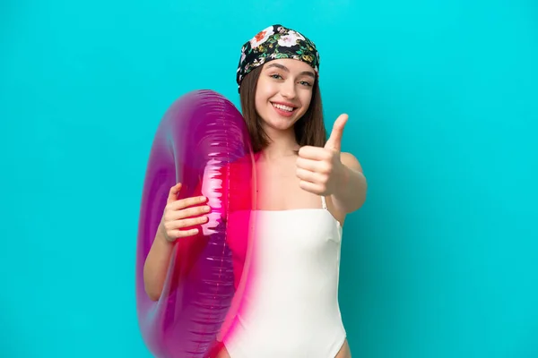 Young Ukrainian Woman Holding Air Mattress Isolated Blue Background Thumbs — ストック写真
