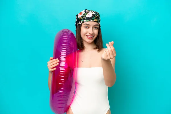 Young Ukrainian Woman Holding Air Mattress Isolated Blue Background Making — ストック写真