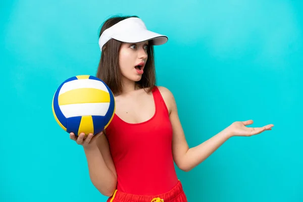 Young Ukrainian Woman Playing Volleyball Beach Isolated Blue Background Surprise — стокове фото