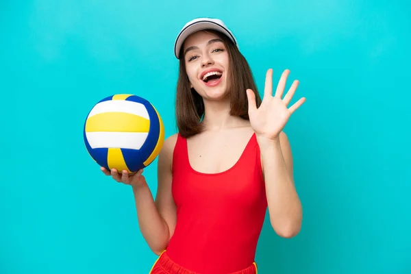 Young Ukrainian Woman Playing Volleyball Beach Isolated Blue Background Counting — 스톡 사진