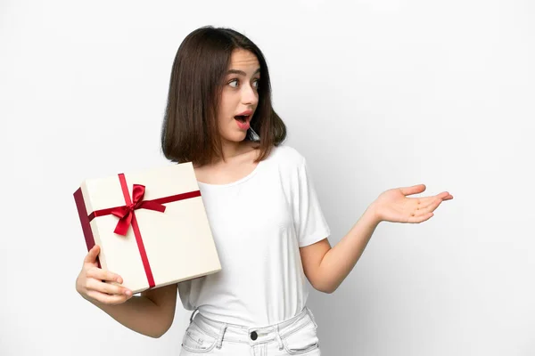 Young Ukrainian Woman Holding Gift Isolated White Background Surprise Facial — 스톡 사진