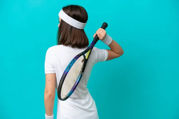 Joven Ucraniana Aislada Sobre Fondo Azul Jugando Tenis —  Fotos de Stock