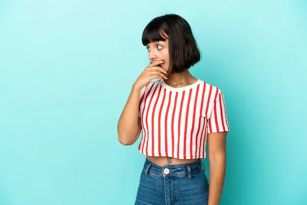 Young Mixed Race Woman Isolated Blue Background Doing Surprise Gesture — Stock Photo, Image