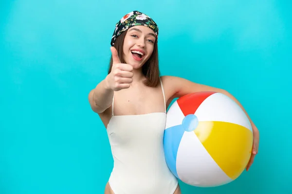 Young Ukrainian Woman Holding Beach Ball Isolated Blue Background Thumbs — Stok fotoğraf