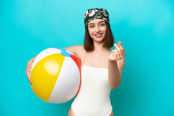 Young Ukrainian Woman Holding Beach Ball Isolated Blue Background Making — Stok fotoğraf