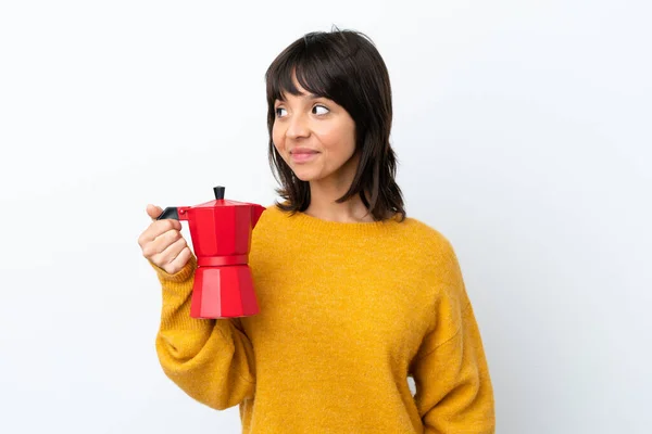 Young Mixed Race Woman Holding Coffee Pot Isolated White Background — Stock fotografie