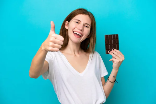 Young English Woman Chocolat Isolated Blue Background Thumbs Because Something — Stock fotografie
