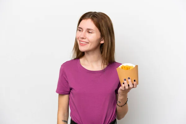 Ung Engelsk Kvinde Holder Stegte Chips Isoleret Hvid Baggrund Ser - Stock-foto