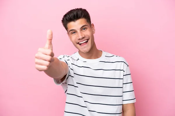 Young Caucasian Man Isolated Pink Background Thumbs Because Something Good — Stock fotografie