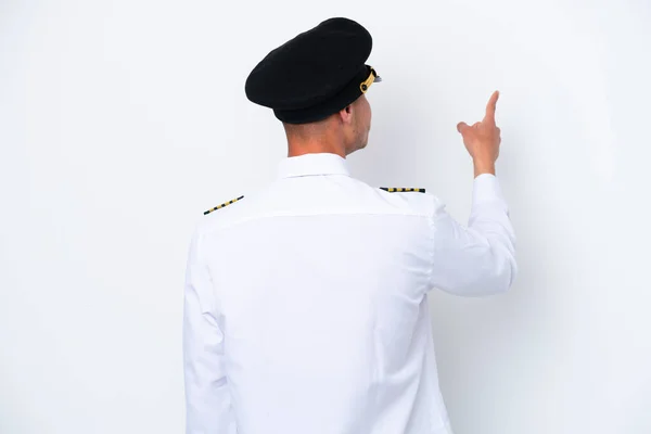 Airplane Caucasian Pilot Isolated White Background Pointing Back Index Finger — Foto de Stock