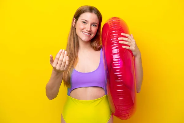 Young Caucasian Woman Holding Air Mattress Isolated Yellow Background Inviting — Foto de Stock