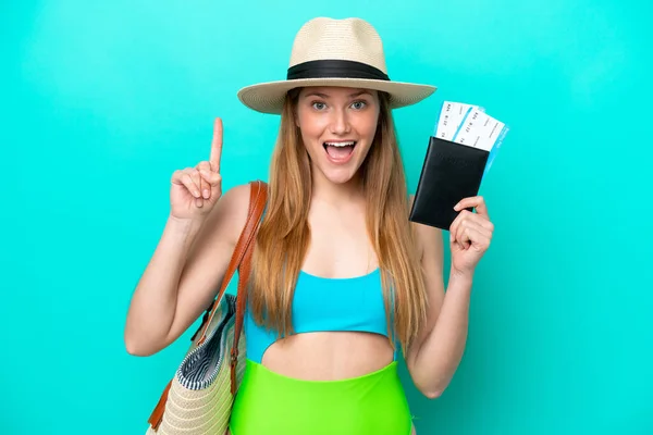 Traveler Caucasian Woman Holding Passport Isolated Blue Background Pointing Great — ストック写真