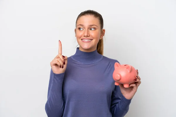 Young Caucasian Woman Holding Piggybank Isolated White Background Intending Realizes — Stockfoto