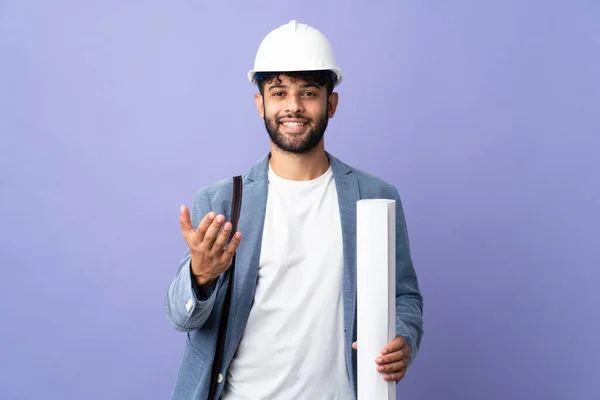 Young Architect Moroccan Man Helmet Holding Blueprints Isolated Background Inviting — ストック写真