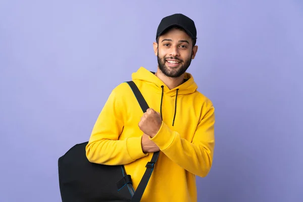 Young Sport Moroccan Man Sport Bag Isolated Purple Background Celebrating —  Fotos de Stock