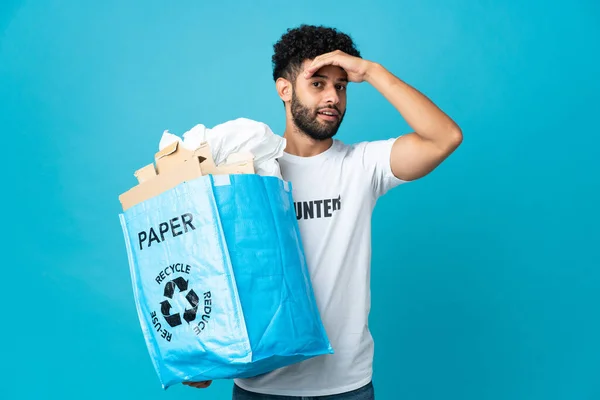 Young Moroccan Man Holding Recycling Bag Full Paper Recycle Isolated — стокове фото
