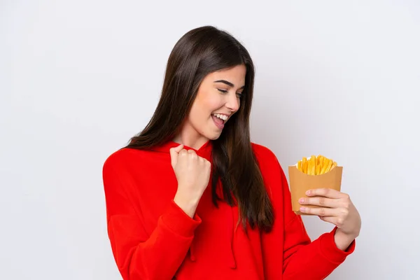 Young Brazilian Woman Catching French Fries Isolated White Background Celebrating — ストック写真