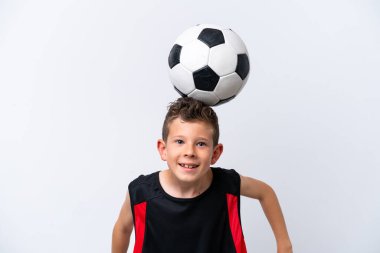 Boy playing football over isolated white wall