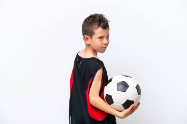 Little caucasian boy isolated on white background with soccer ball