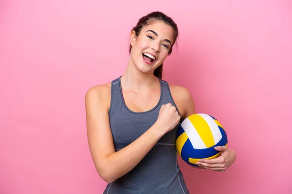 Young Brazilian Woman Playing Volleyball Isolated Pink Background Celebrating Victory — Stok fotoğraf